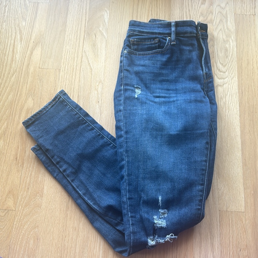 Levi's 711 skinny dark wash distressed jeans